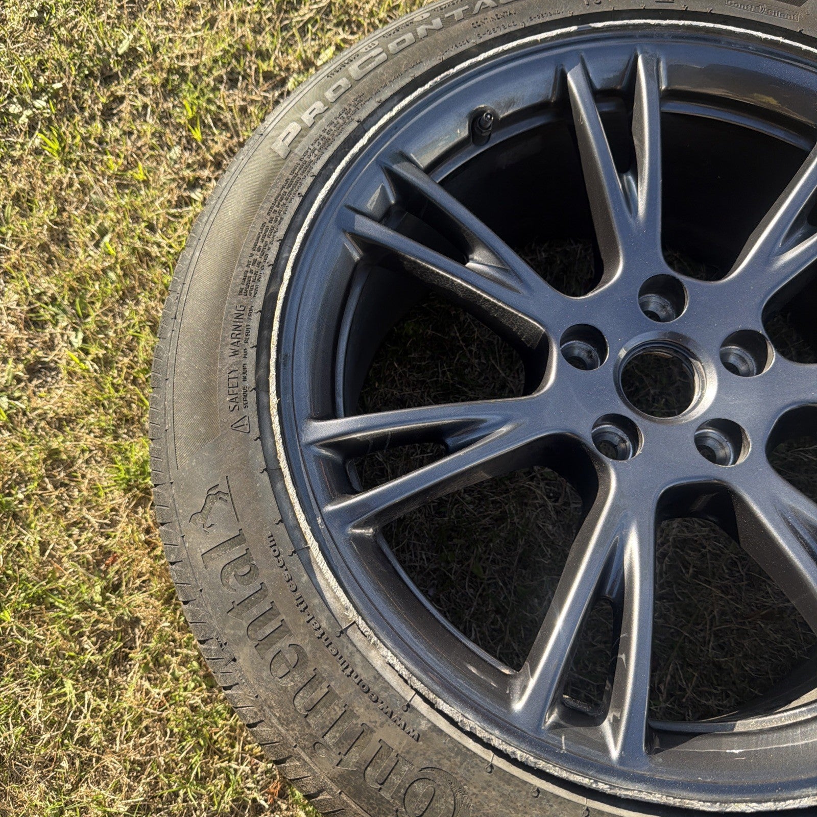 24-25 Tesla Model Y  19" Grey Gemini Rim Wheel Continental Tire W/OEM TPMS