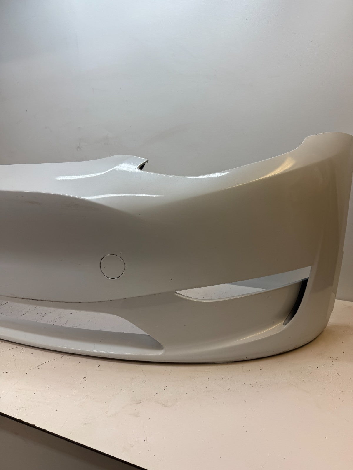 2022-2024 Tesla Model Y Front Bumper Cover w/o Sensor Holes OEM 1687994-TX-A