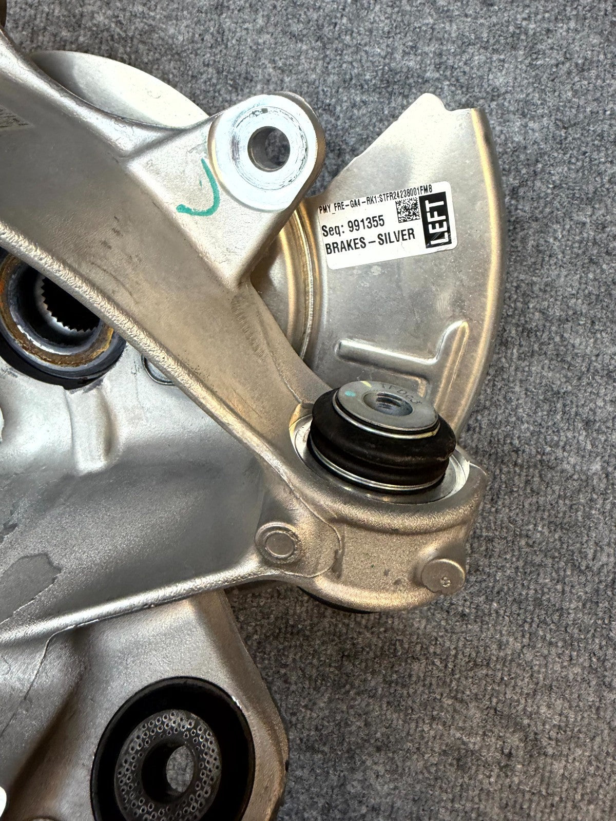 2020-2024 TESLA MODEL Y REAR LEFT SPINDLE KNUCKLE HUB & SHIELD OEM, 1188411-00-G