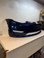 2022-2024 Tesla Model Y Front Bumper Cover W/O Sensor Holes OEM P1687994-TX-A