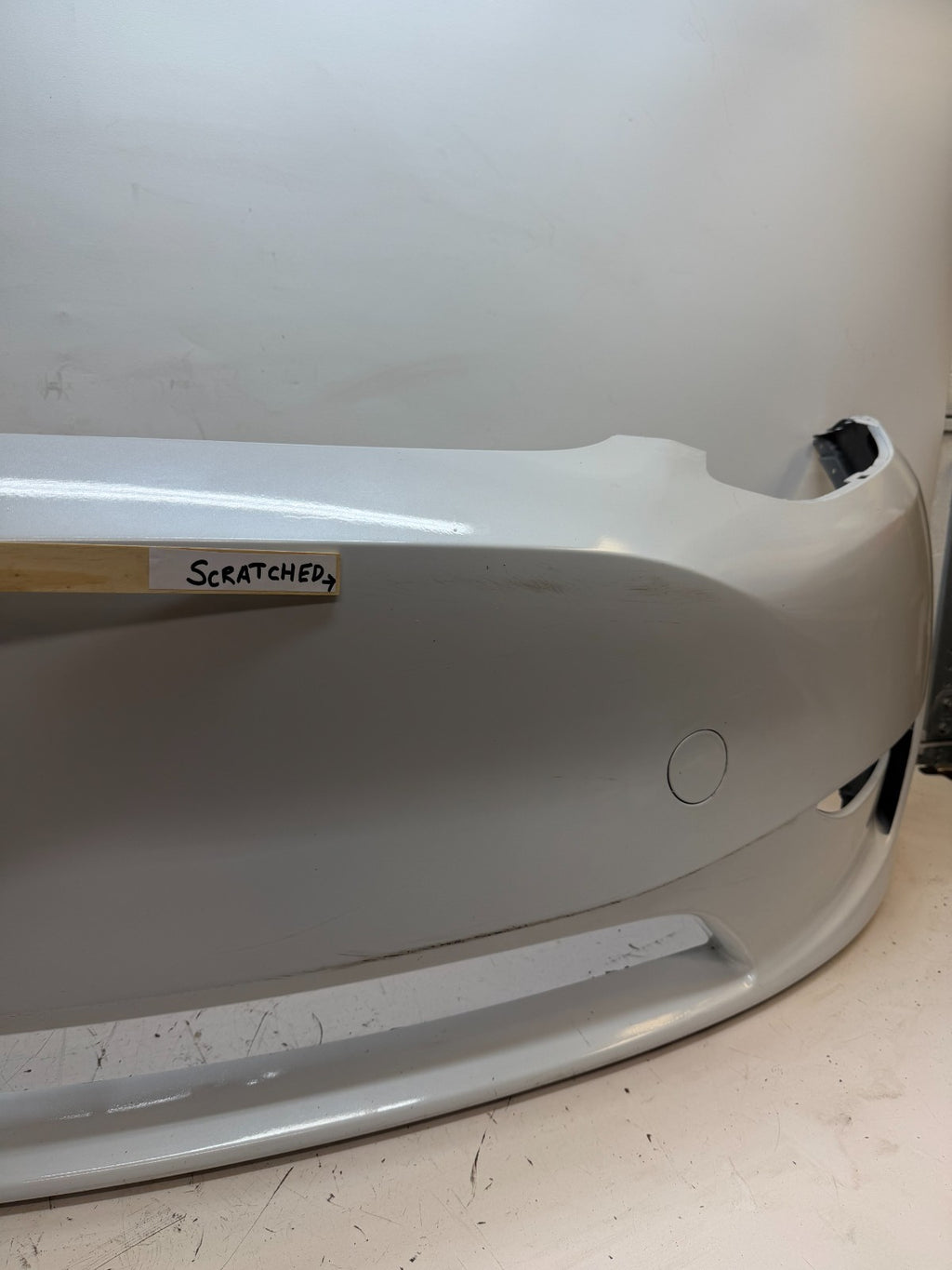 2022-2024 Tesla Model Y Front Bumper Cover w/o Sensor Holes OEM 1687994-TX-A