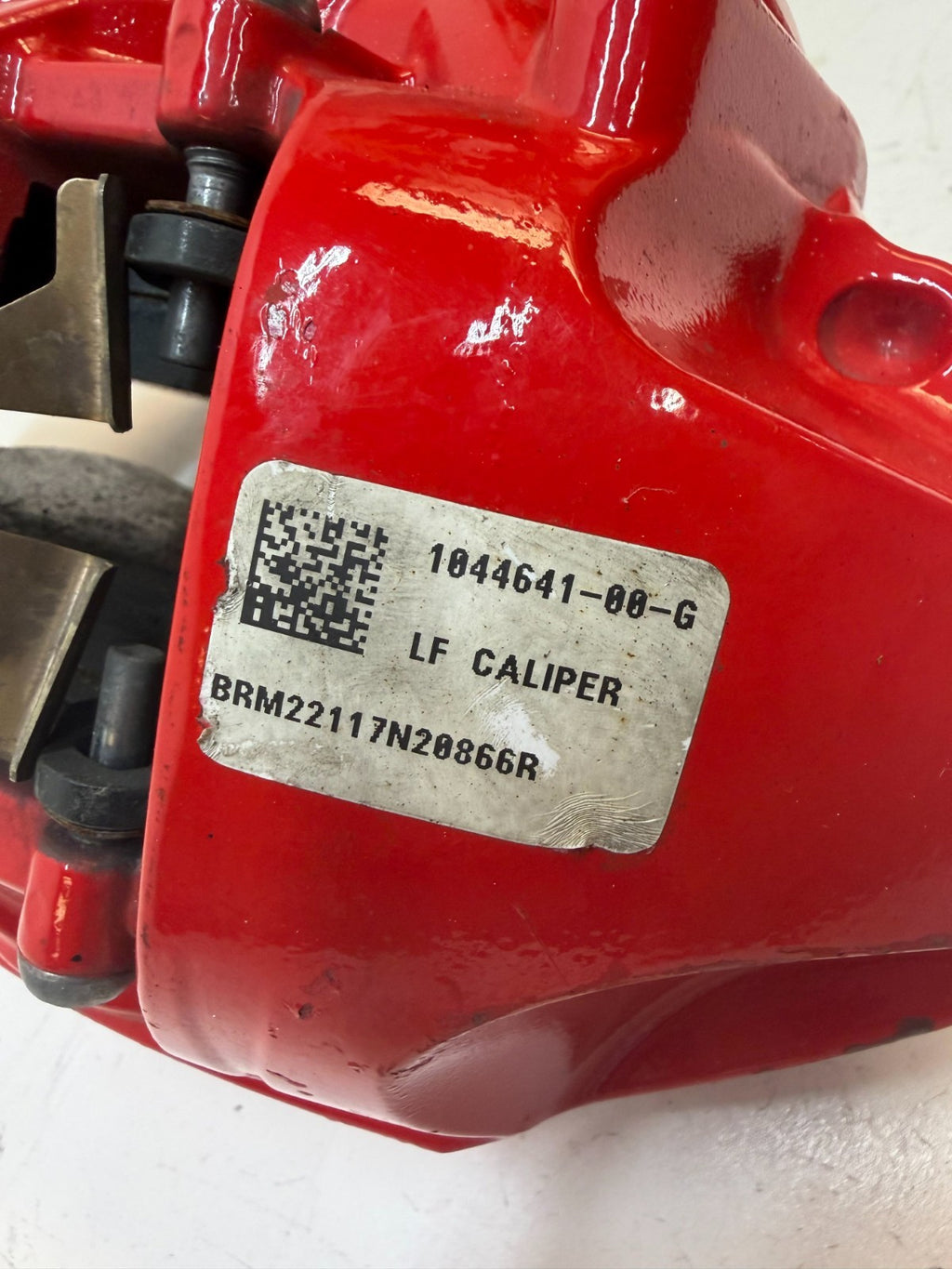 2017-23 Tesla Model 3 Front Left Brake Caliper Red OEM 1044641-00-G
