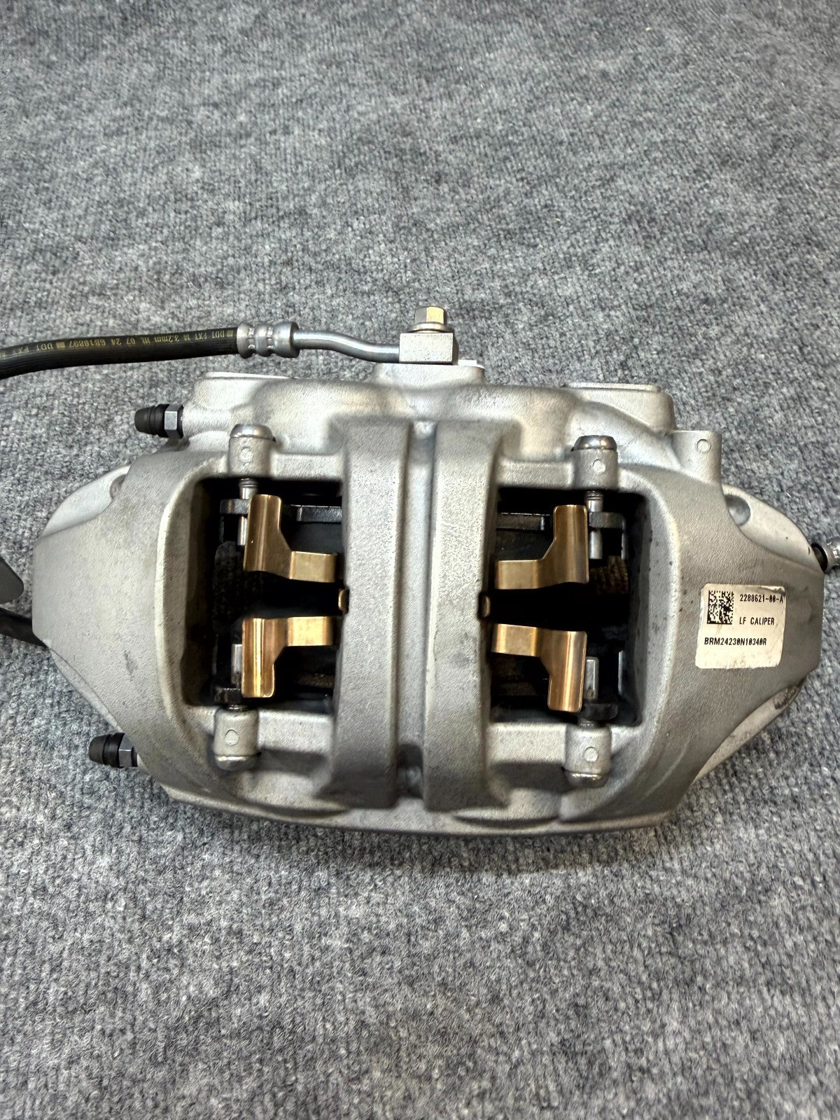 20-24 TESLA MODEL Y FRONT LEFT BRAKE CALIPER W/BREAK HOSE LINE OEM, 2288621-00-A