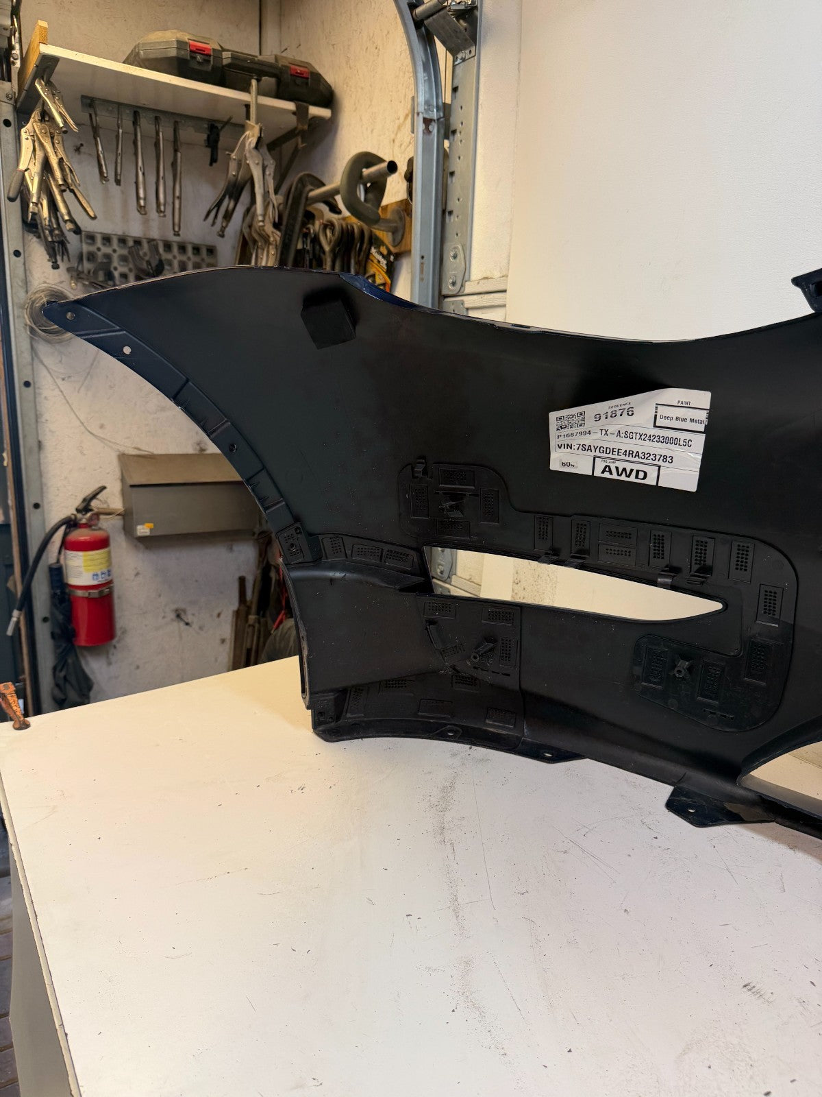 2022-2024 Tesla Model Y Front Bumper Cover W/O Sensor Holes OEM P1687994-TX-A