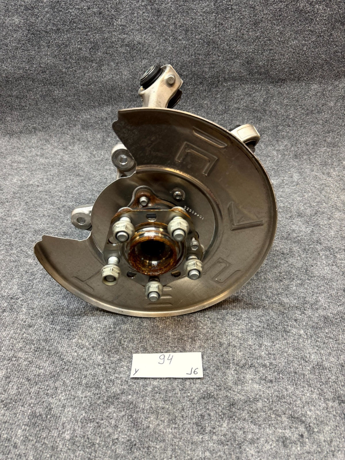 2020-2024 TESLA MODEL Y REAR LEFT SPINDLE KNUCKLE HUB & SHIELD OEM, 1188411-00-G