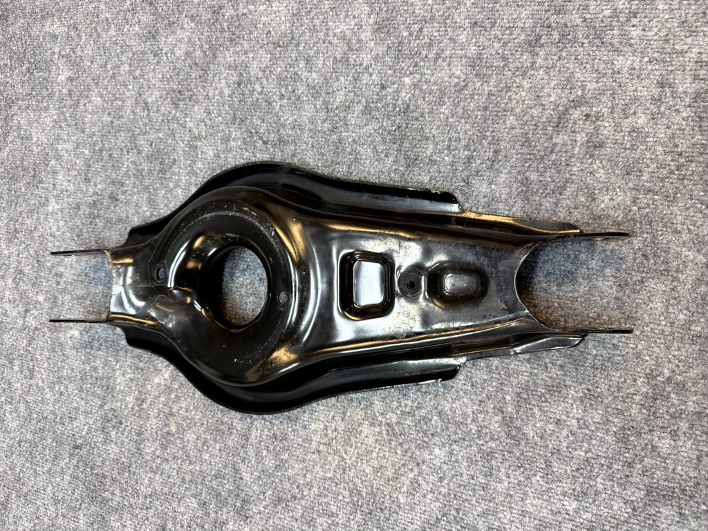 2020-2024 TESLA MODEL Y REAR LEFT LOWER CONTROL ARM SPRING PERCH OEM, 1044451-00