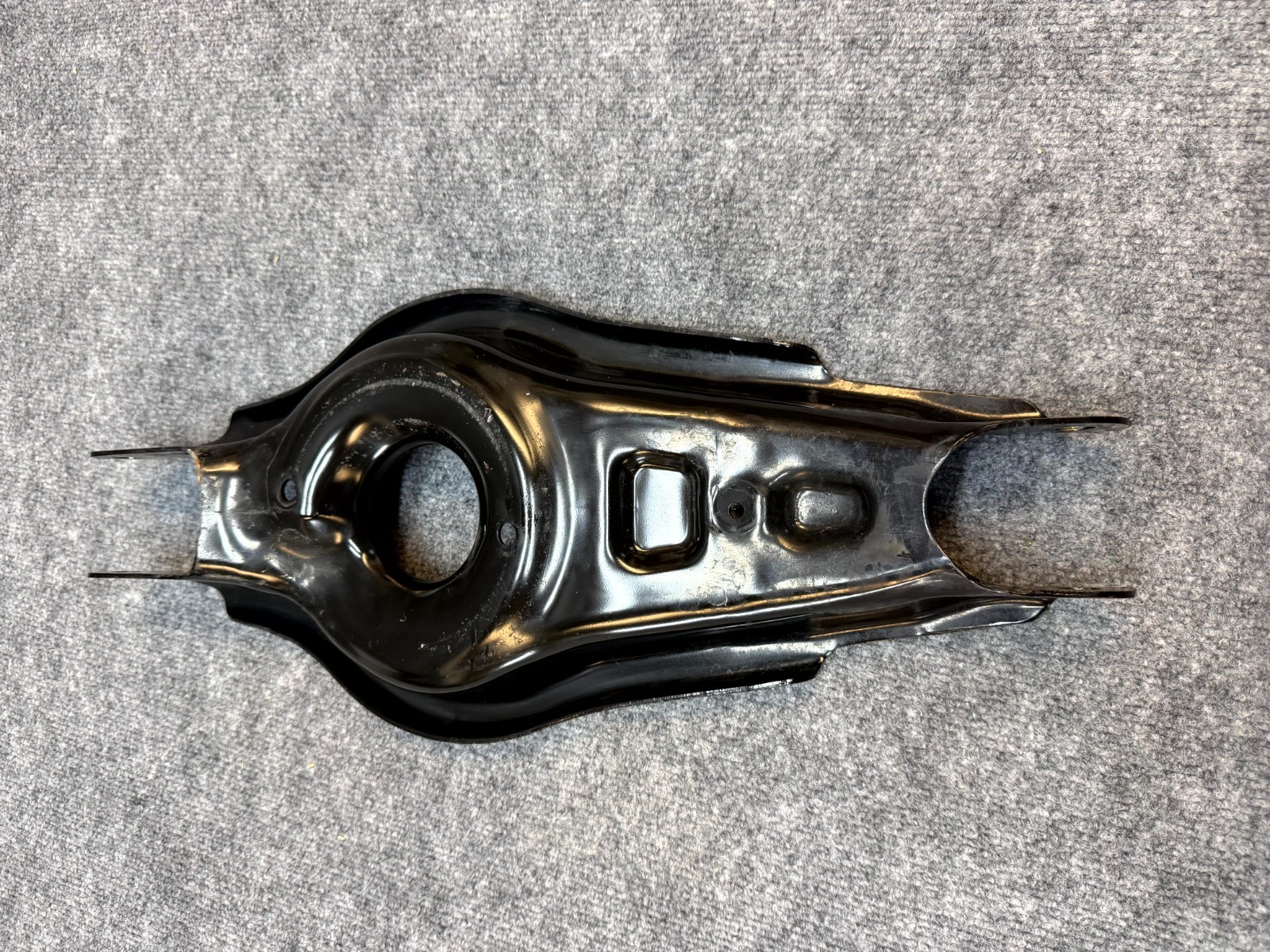 2020-2024 TESLA MODEL Y REAR LEFT LOWER CONTROL ARM SPRING PERCH OEM, 1044451-00