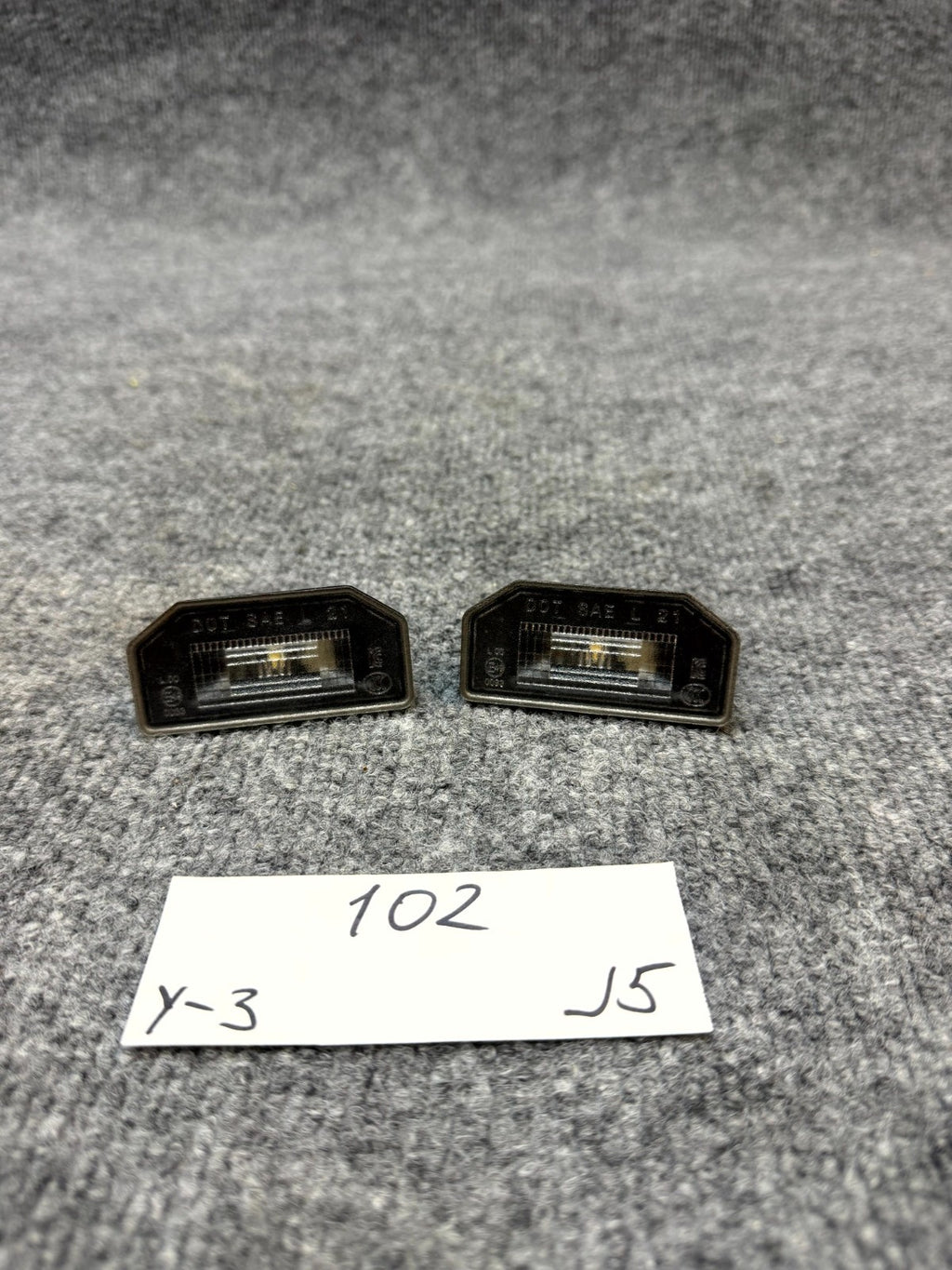 17 - 24 TESLA MODEL 3 Y REAR LEFT OR RIGHT LICENSE PLATE LIGHT OEM, 1713282-00-A