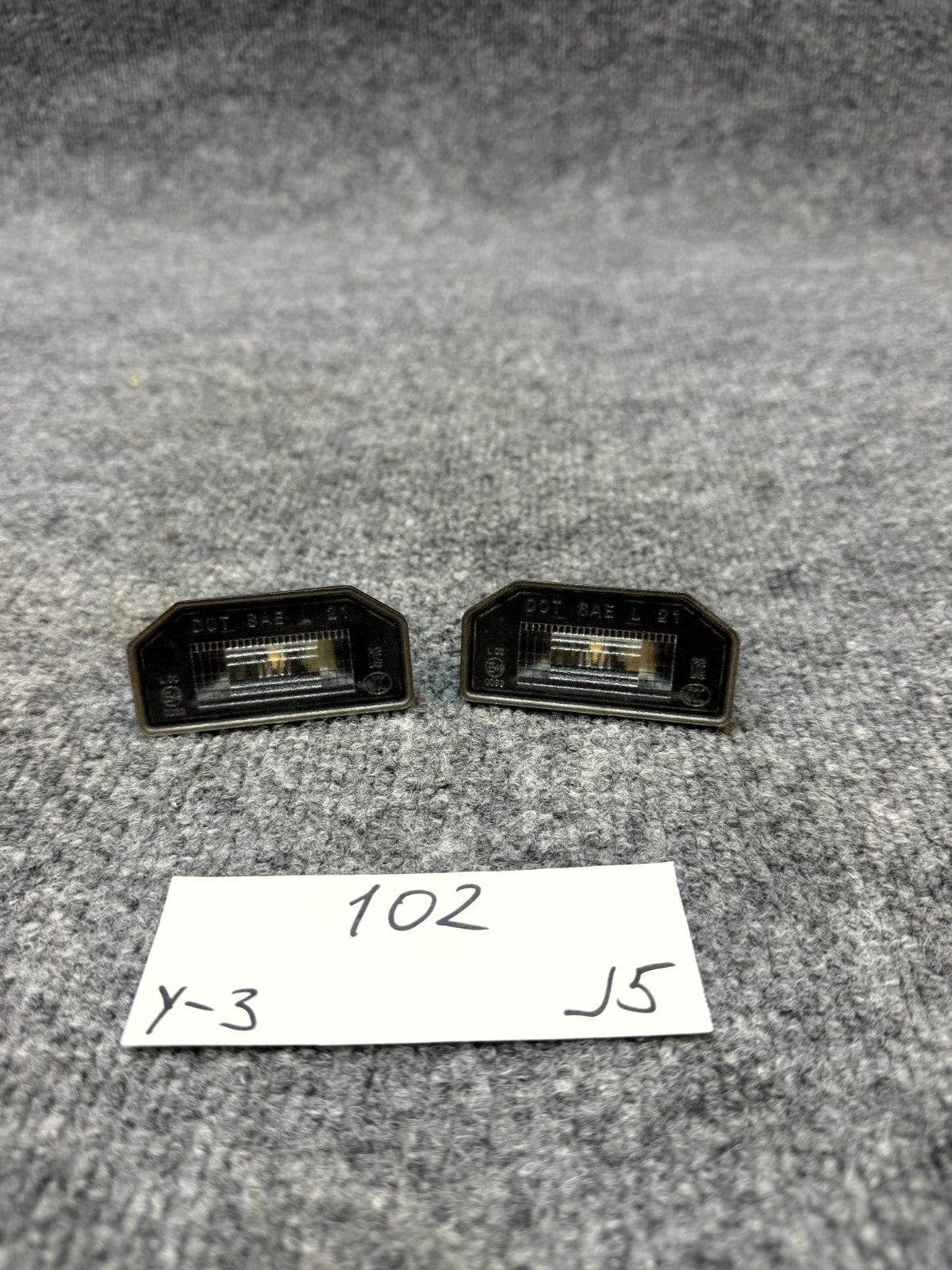 17 - 24 TESLA MODEL 3 Y REAR LEFT OR RIGHT LICENSE PLATE LIGHT OEM, 1713282-00-A
