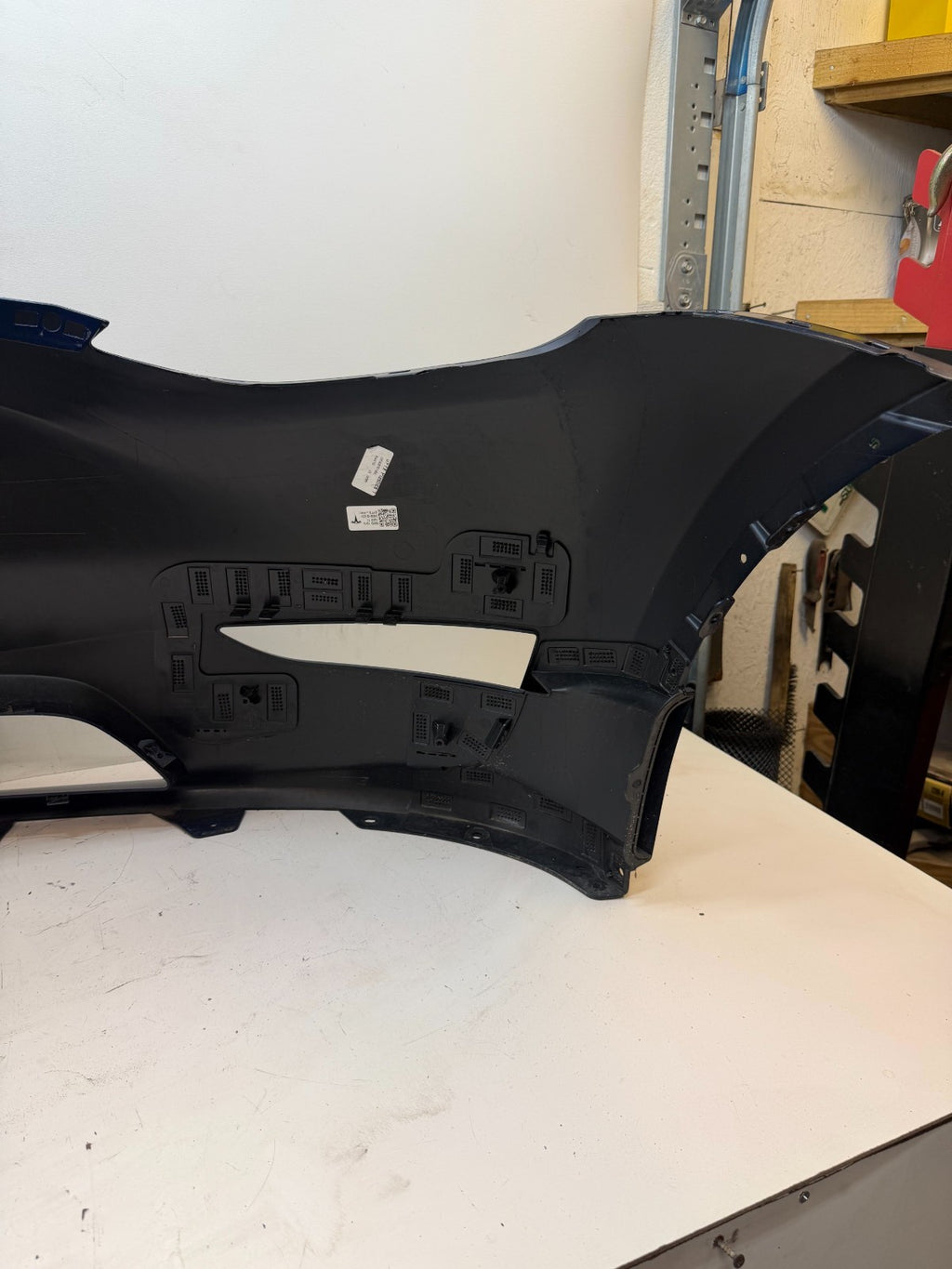 2022-2024 Tesla Model Y Front Bumper Cover W/O Sensor Holes OEM P1687994-TX-A