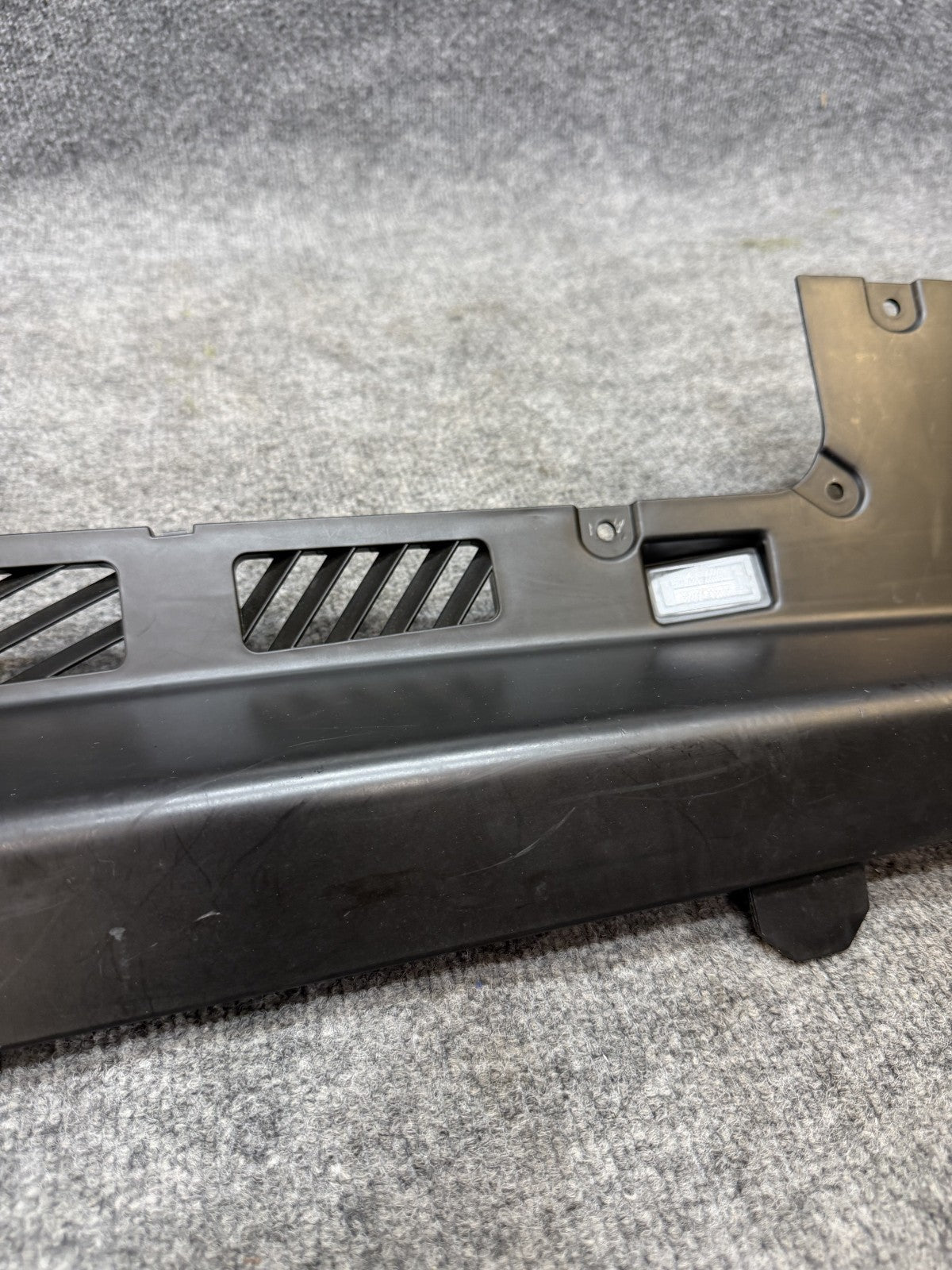 2020-2024 TESLA MODEL Y RIGHT PASSENGER SIDE FOOTWELL COVER OEM, 1833395-00-A