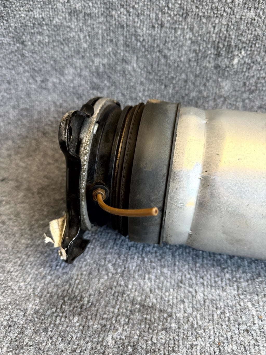 2016 – 2020 TESLA MODEL S REAR LEFT SIDE AIR SPRING SHOCK OEM,  1067461-00-C