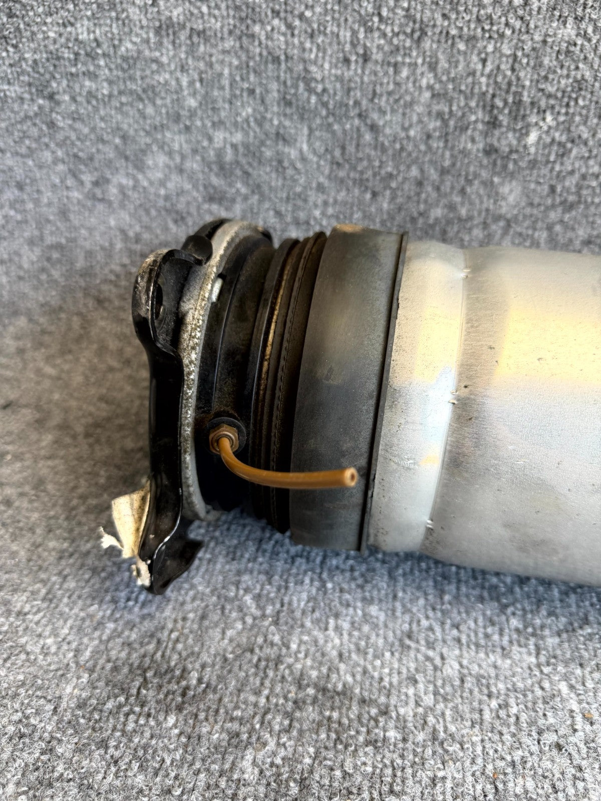 2016 – 2020 TESLA MODEL S REAR LEFT SIDE AIR SPRING SHOCK OEM,  1067461-00-C
