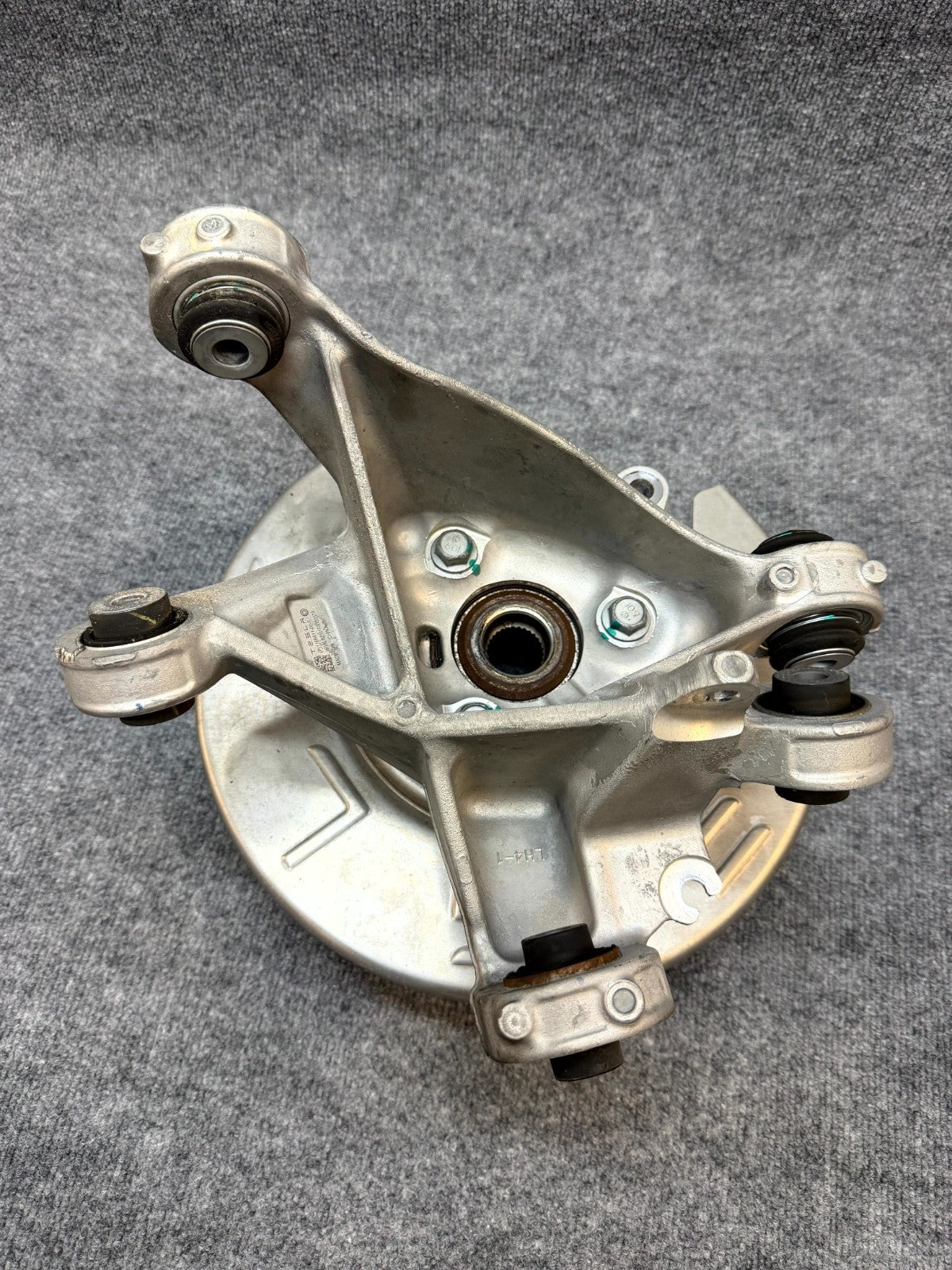 2020-2024 TESLA MODEL Y REAR LEFT SPINDLE KNUCKLE HUB & SHIELD OEM, 1188411-00-F