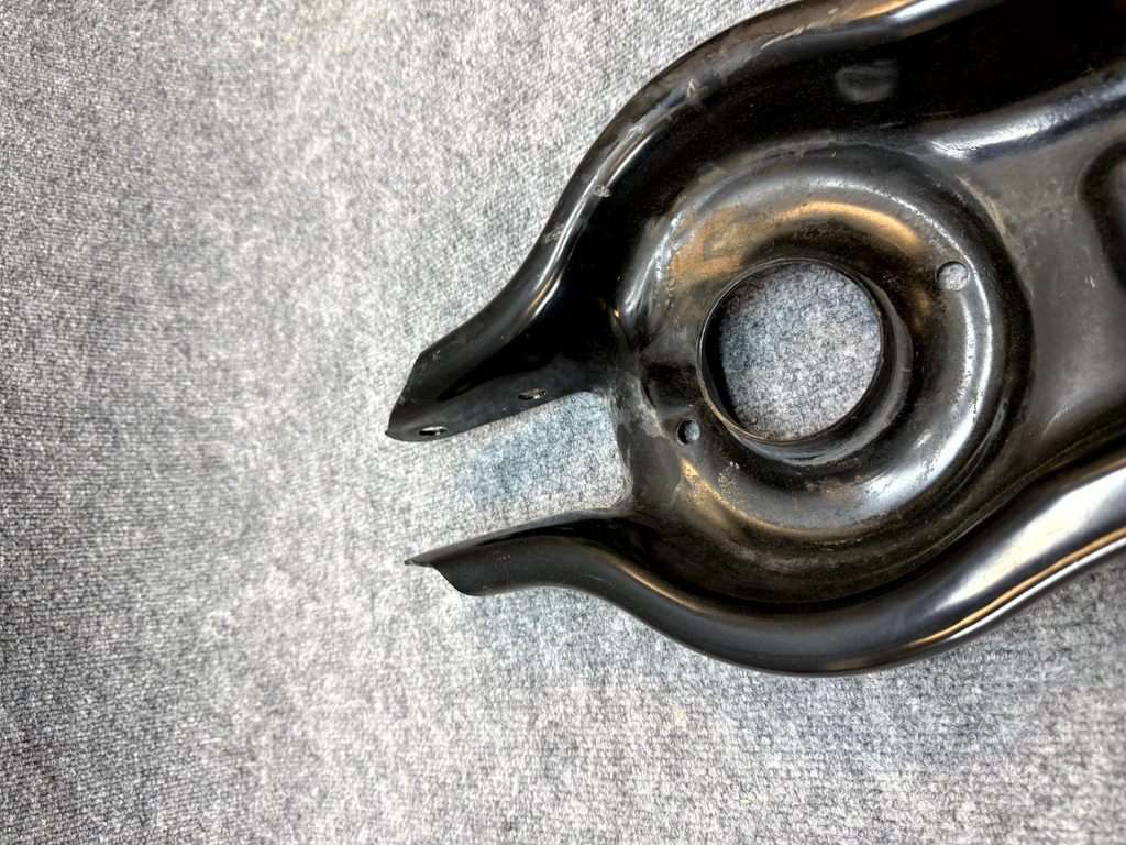 2020-2024 TESLA MODEL Y REAR LEFT LOWER CONTROL ARM SPRING PERCH OEM, 1044451-00
