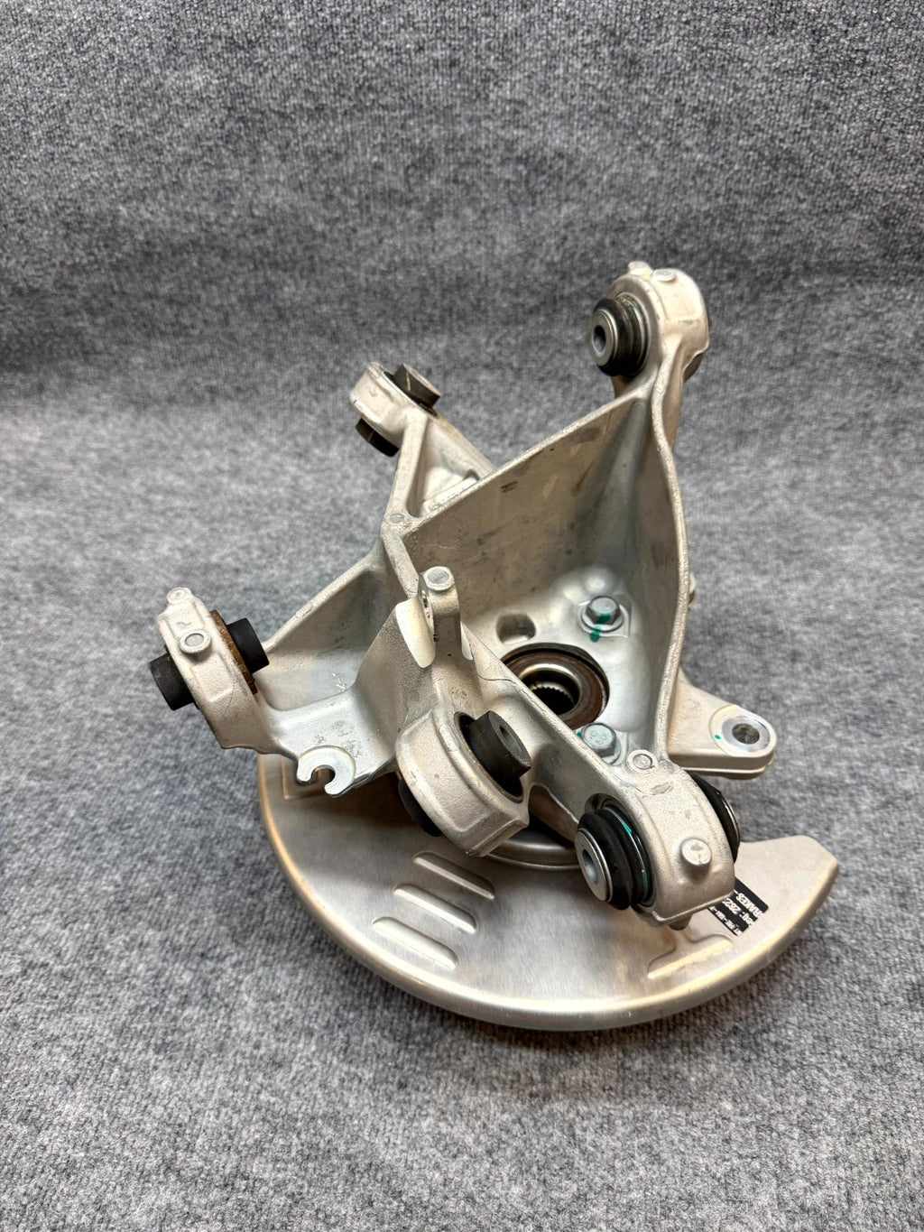2020-2024 TESLA MODEL Y REAR LEFT SPINDLE KNUCKLE HUB & SHIELD OEM, 1188411-00-F