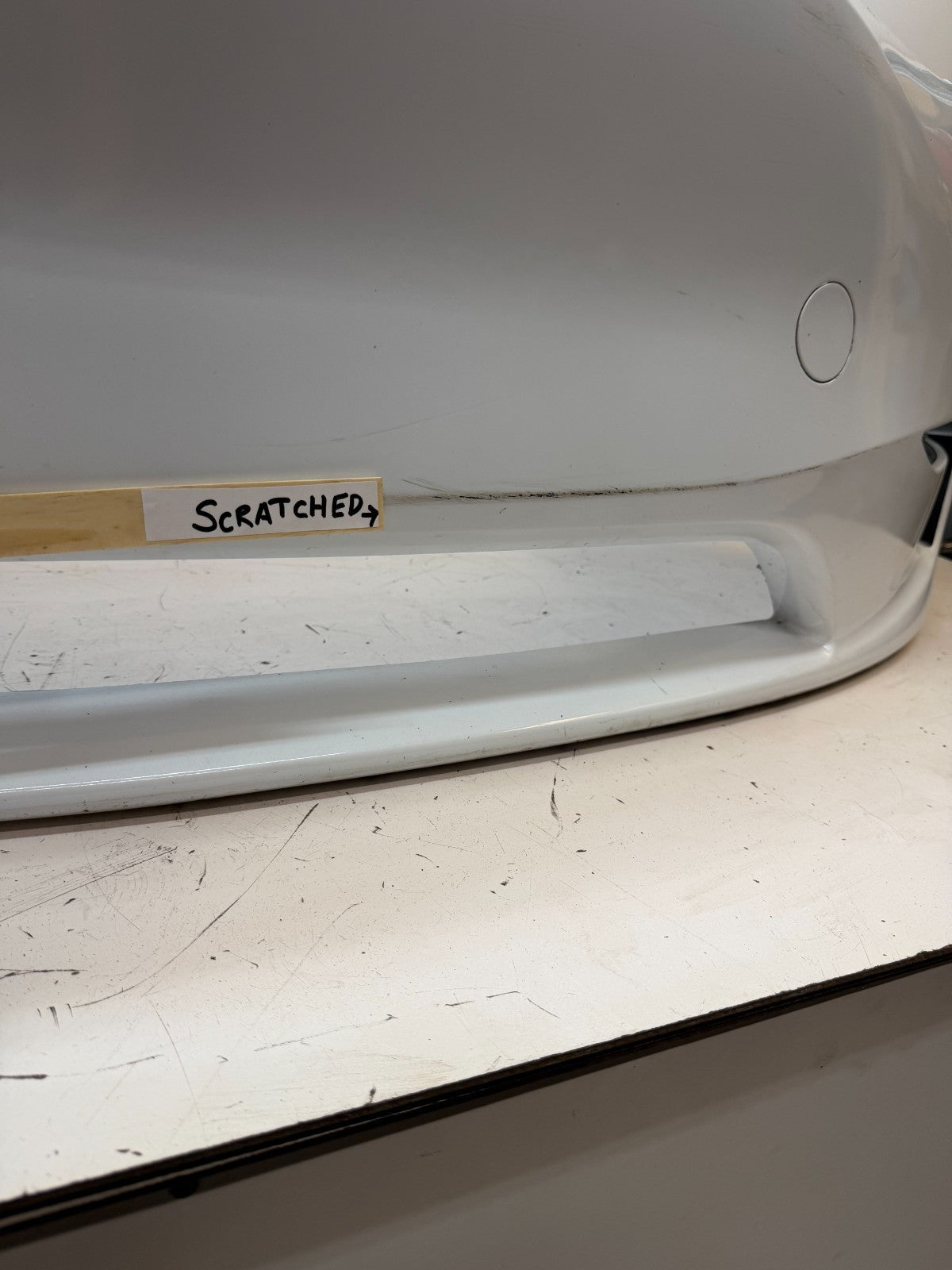 2022-2024 Tesla Model Y Front Bumper Cover w/o Sensor Holes OEM 1687994-TX-A