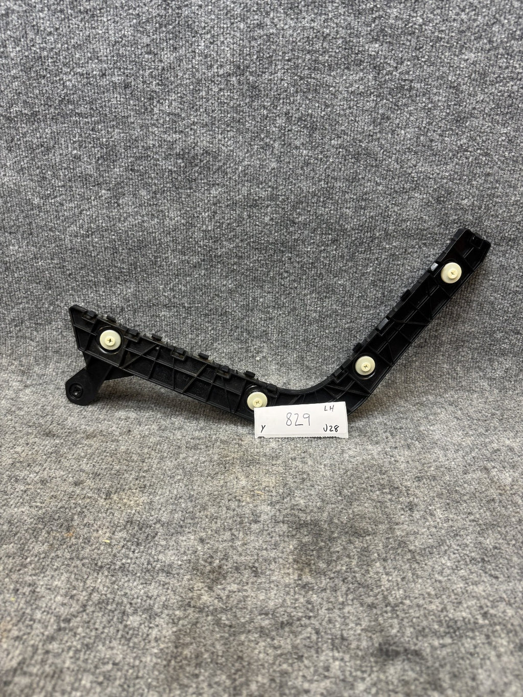 2020–2024 TESLA MODEL Y REAR LEFT SIDE BUMPER RETAINER BRACKET OEM, 1494036-00-A