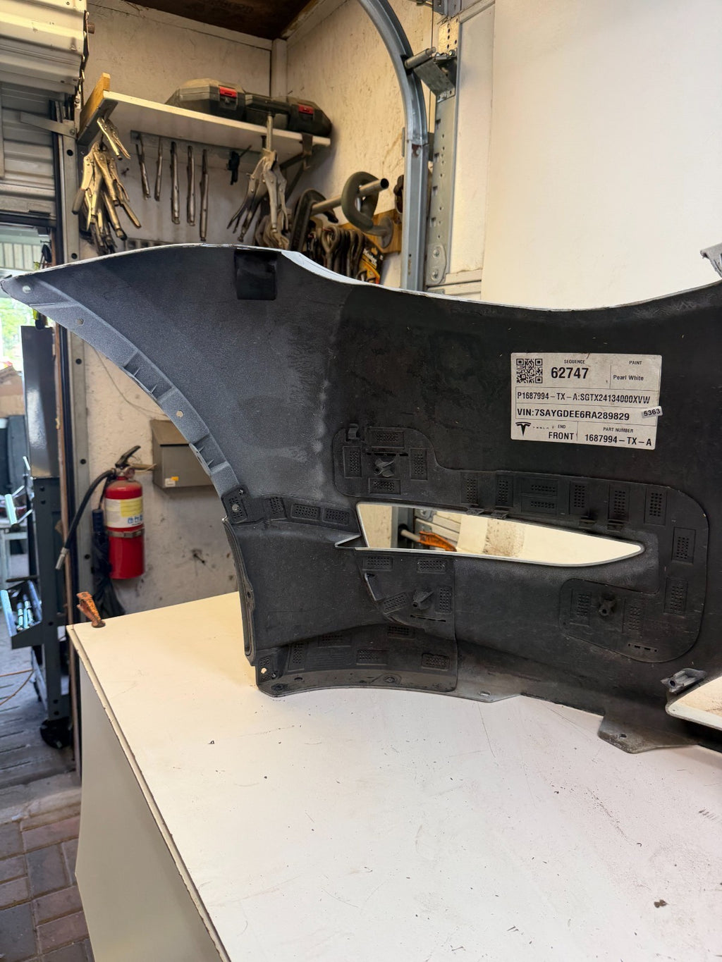 2022-2024 Tesla Model Y Front Bumper Cover w/o Sensor Holes OEM 1687994-TX-A