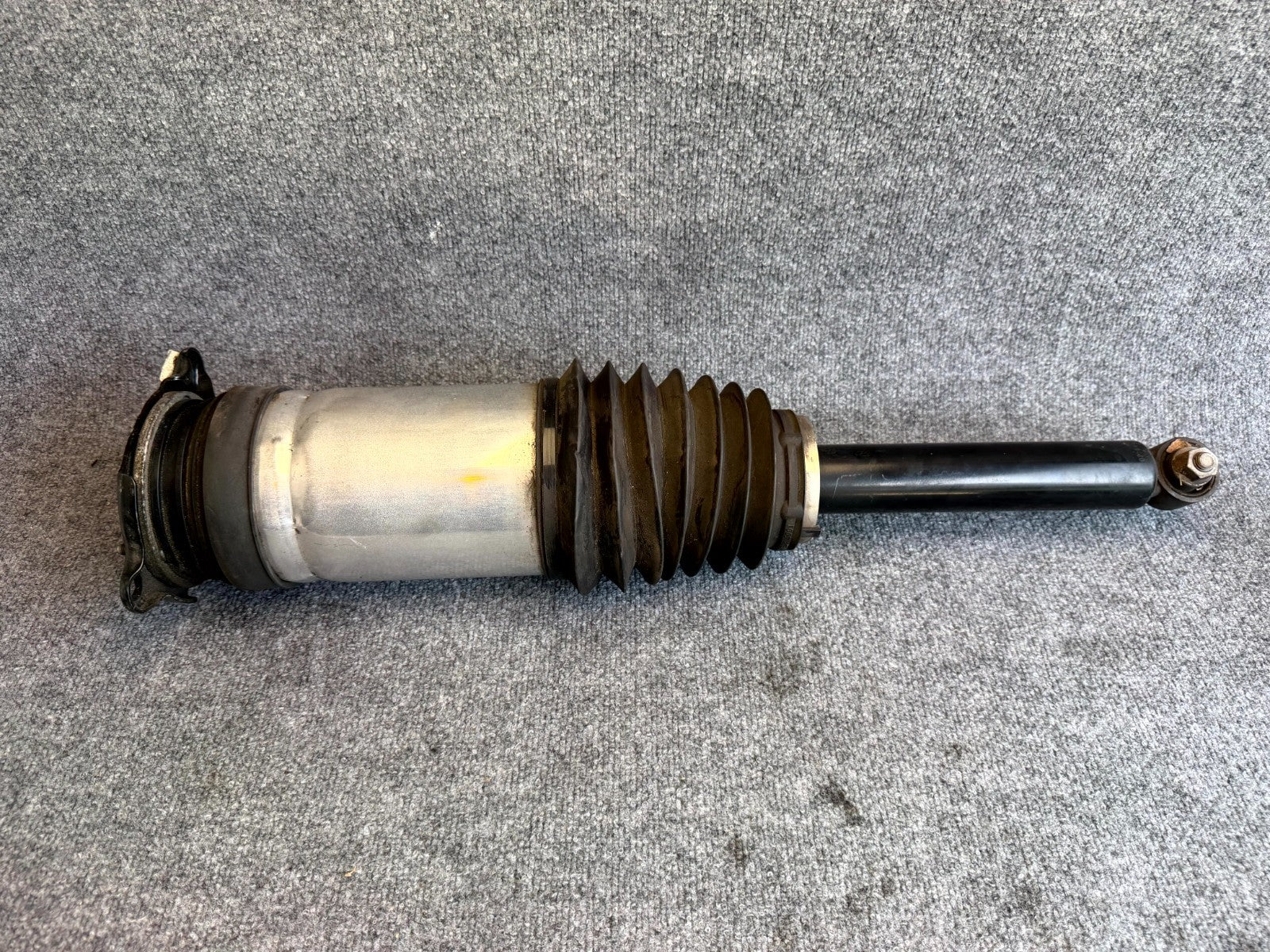 2016 – 2020 TESLA MODEL S REAR LEFT SIDE AIR SPRING SHOCK OEM,  1067461-00-C