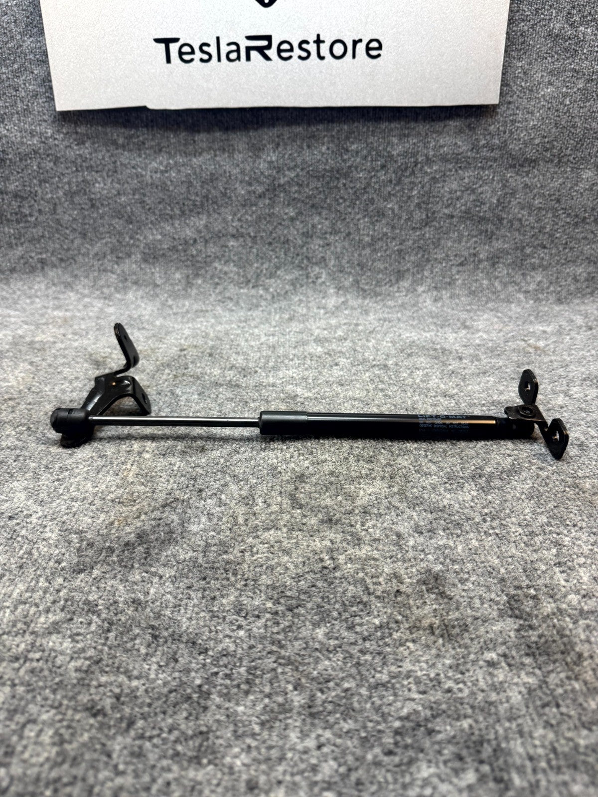 2017‑2023 TESLA MODEL 3 FRONT LEFT HOOD STRUT SUPPORT BRACKET OEM, 1089587-00-C