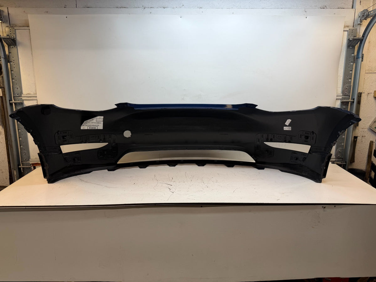 2022-2024 Tesla Model Y Front Bumper Cover W/O Sensor Holes OEM P1687994-TX-A