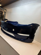 2022-2024 Tesla Model Y Front Bumper Cover W/O Sensor Holes OEM P1687994-TX-A