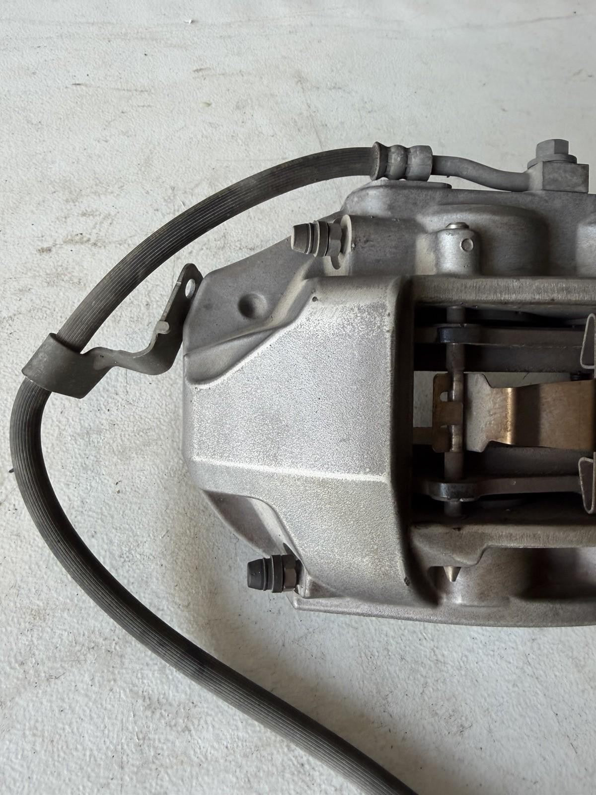♦️17–23 TESLA MODEL 3 FRONT LEFT CALIPER W/ BRAKE HOSE LINE OEM, 1044621-00-E