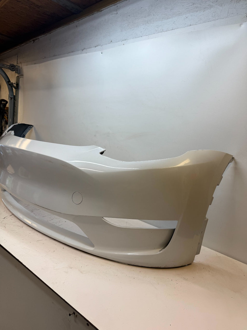 2022-2024 Tesla Model Y Front Bumper Cover w/o Sensor Holes OEM 1687994-TX-A