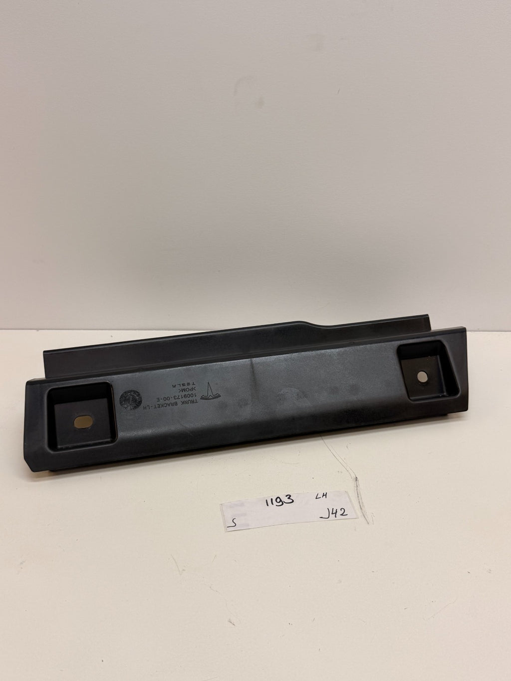 12-20 Model S Rear Driver Side Trunk Carpet Mount Bracket Left 1009173-00-E