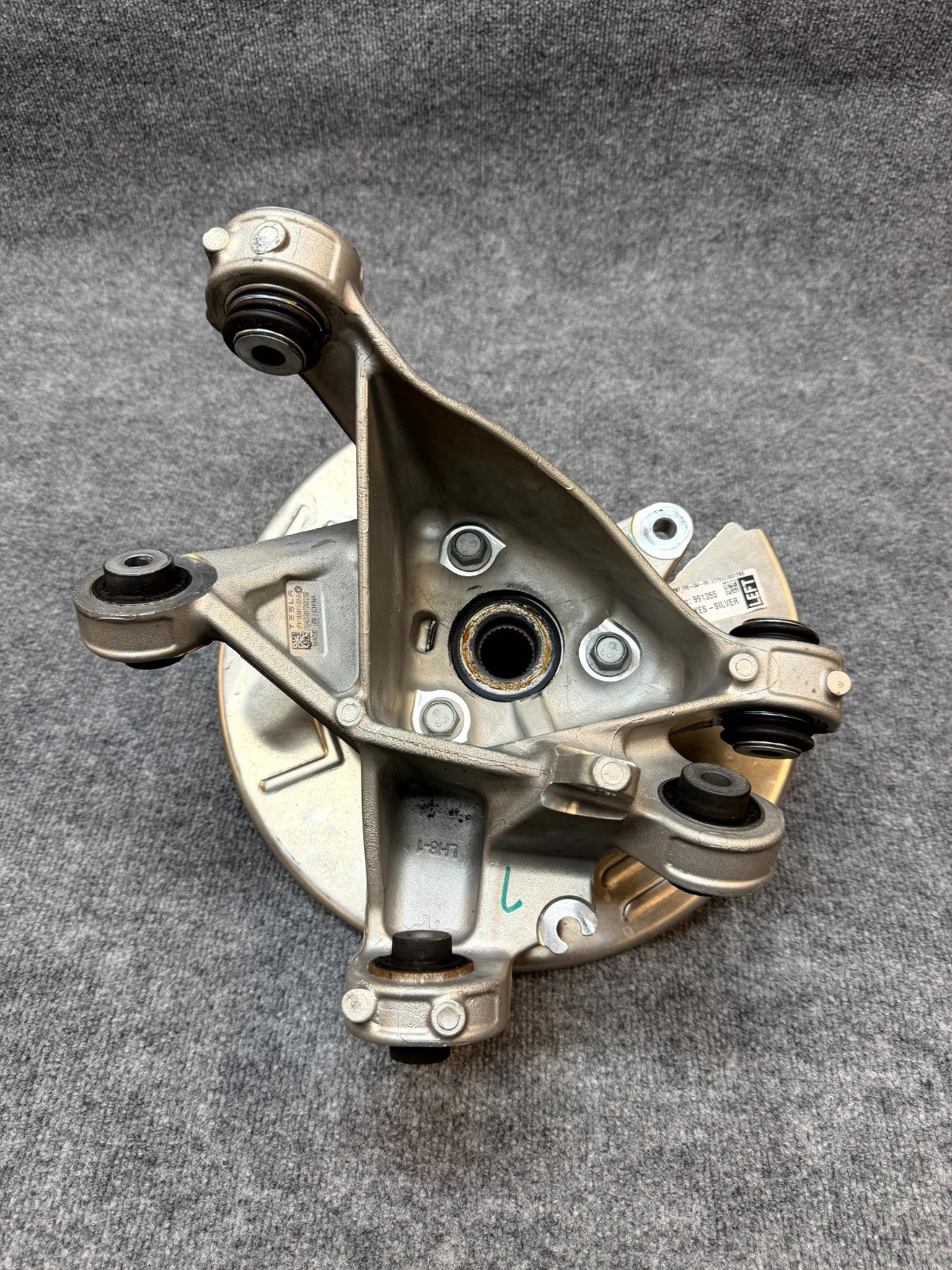 2020-2024 TESLA MODEL Y REAR LEFT SPINDLE KNUCKLE HUB & SHIELD OEM, 1188411-00-G