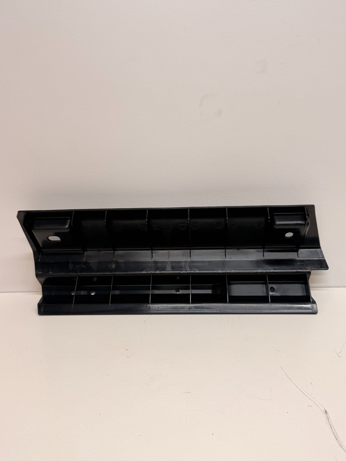 12-20 Model S Rear Driver Side Trunk Carpet Mount Bracket Left 1009173-00-E