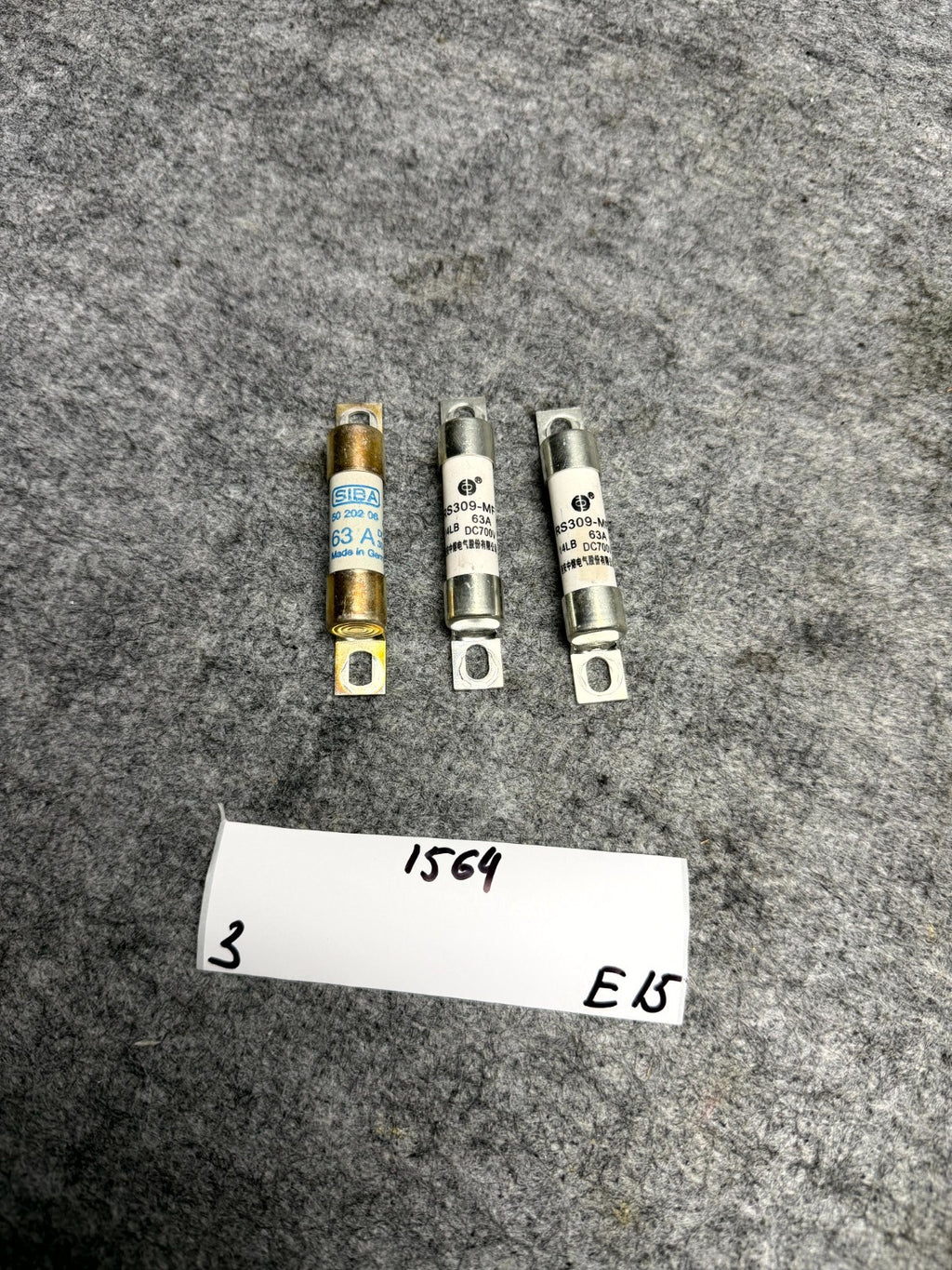 ♦️17-23 TESLA MODEL 3 82 KW 63A 700VDC HV BATTERY FUSE SET OF 3 OEM 1611034-00-A