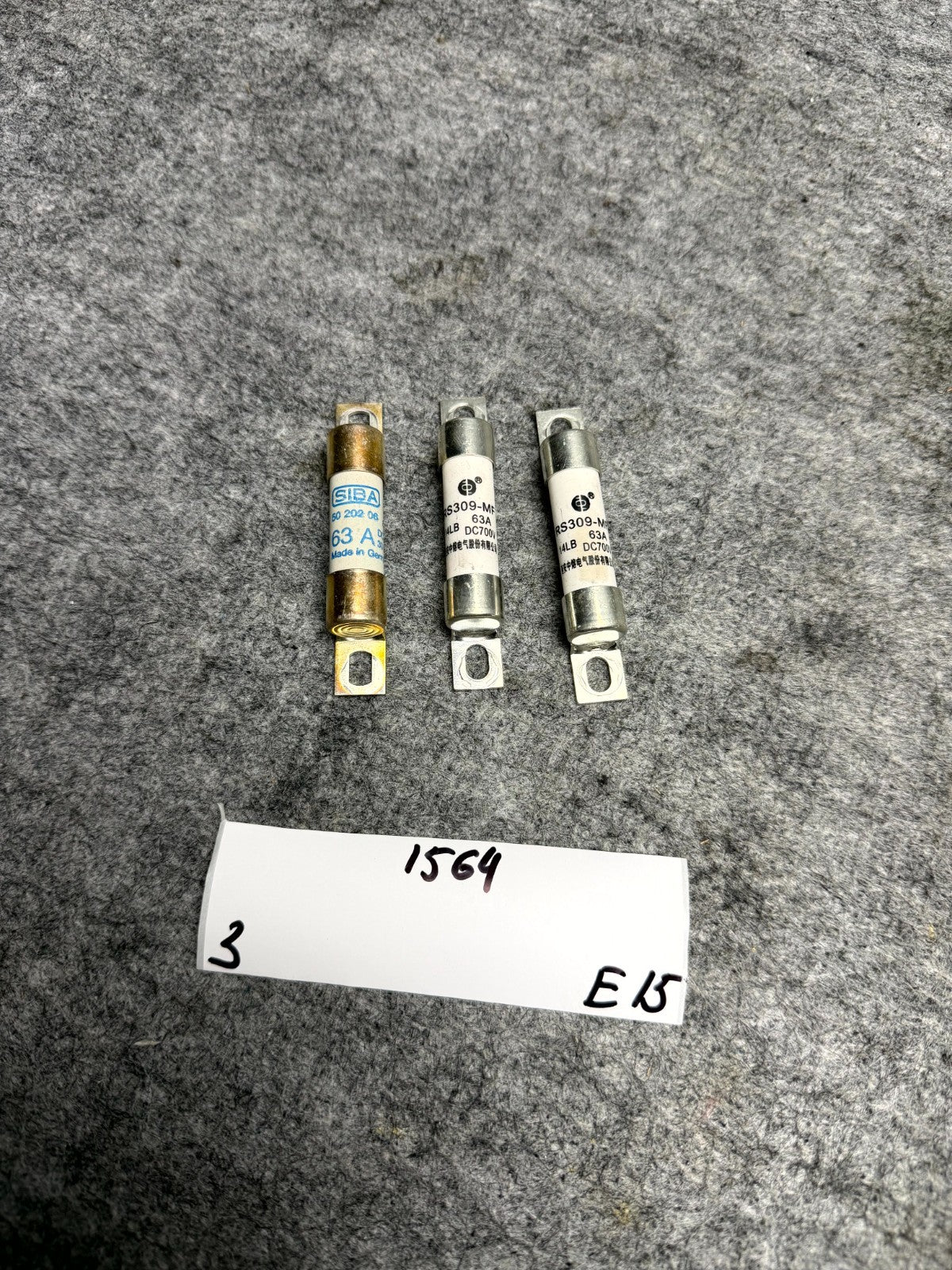 ♦️17-23 TESLA MODEL 3 82 KW 63A 700VDC HV BATTERY FUSE SET OF 3 OEM 1611034-00-A