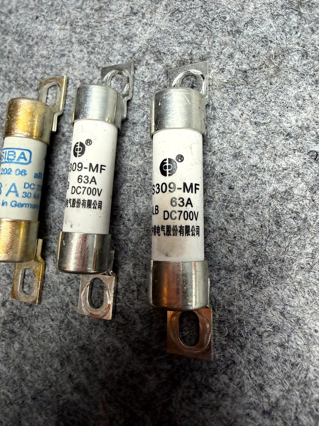 ♦️17-23 TESLA MODEL 3 82 KW 63A 700VDC HV BATTERY FUSE SET OF 3 OEM 1611034-00-A