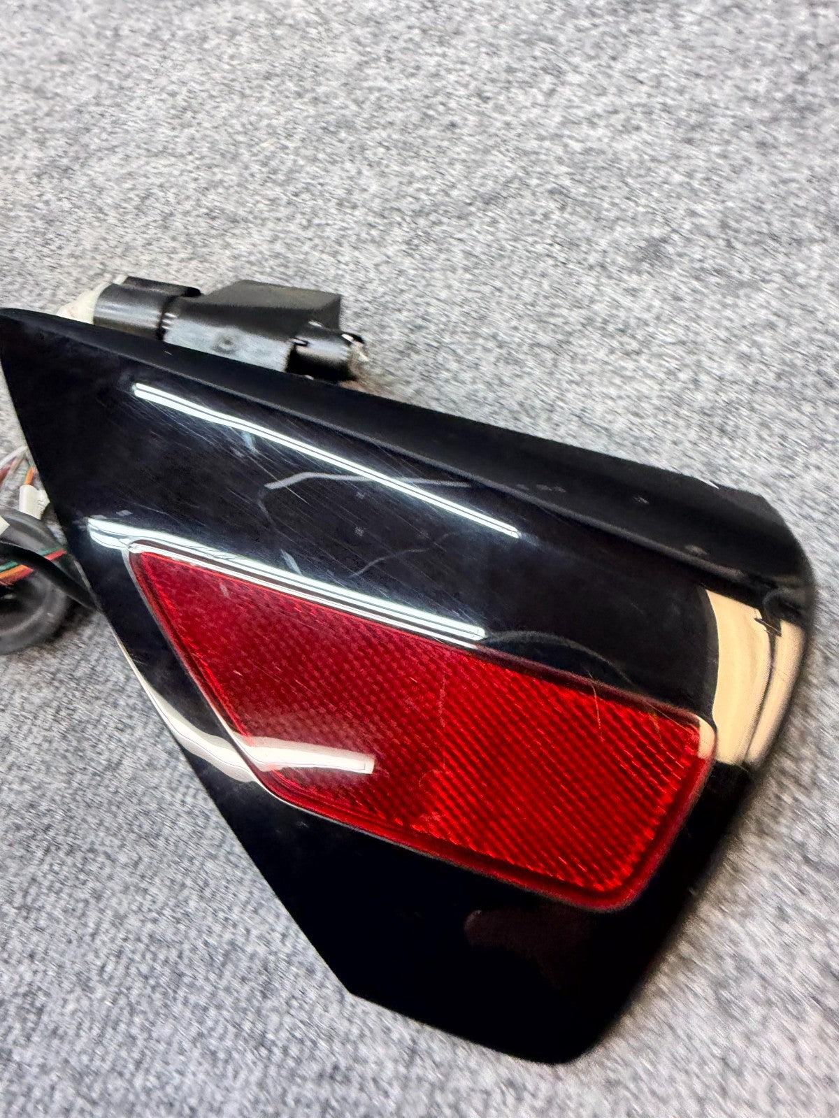 2020-2024 TESLA MODEL Y LEFT CHARGE PORT DOOR REFLECTOR OEM, 1478844-00-A