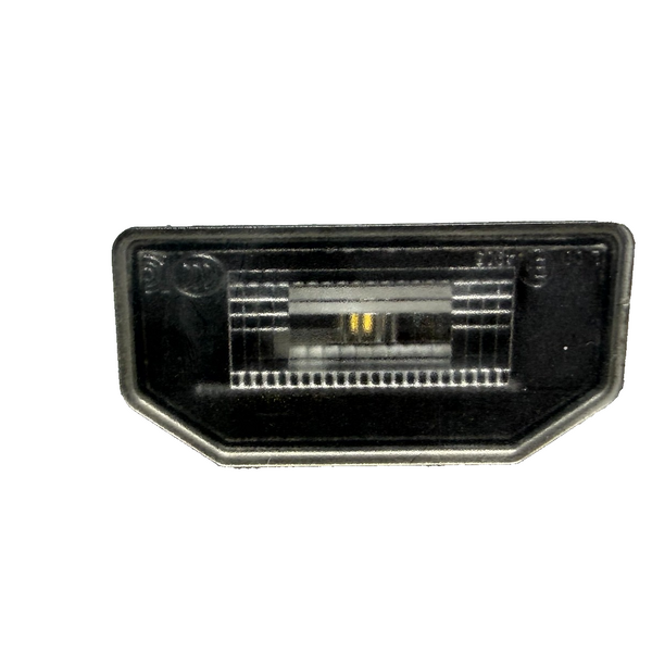 2017 – 2023 TESLA MODEL 3 LICENSE PLATE LIGHT ASSEMBLY OEM, 1449730-00-B