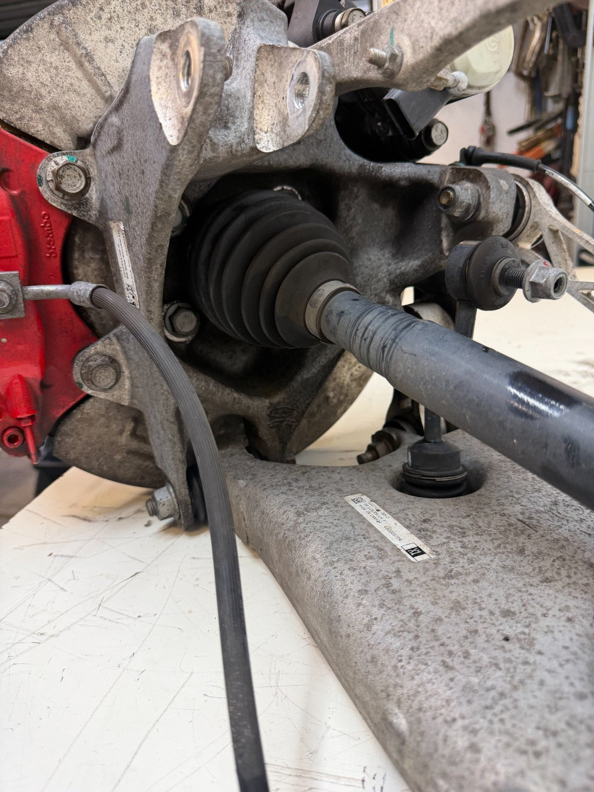 2016–2020 Tesla Model X Rear Left Suspension Knuckle Assembly w/ CV Axle OEM