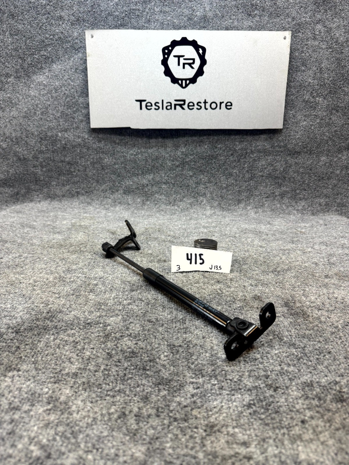 2017‑2023 TESLA MODEL 3 FRONT LEFT HOOD STRUT SUPPORT BRACKET OEM, 1089587-00-C