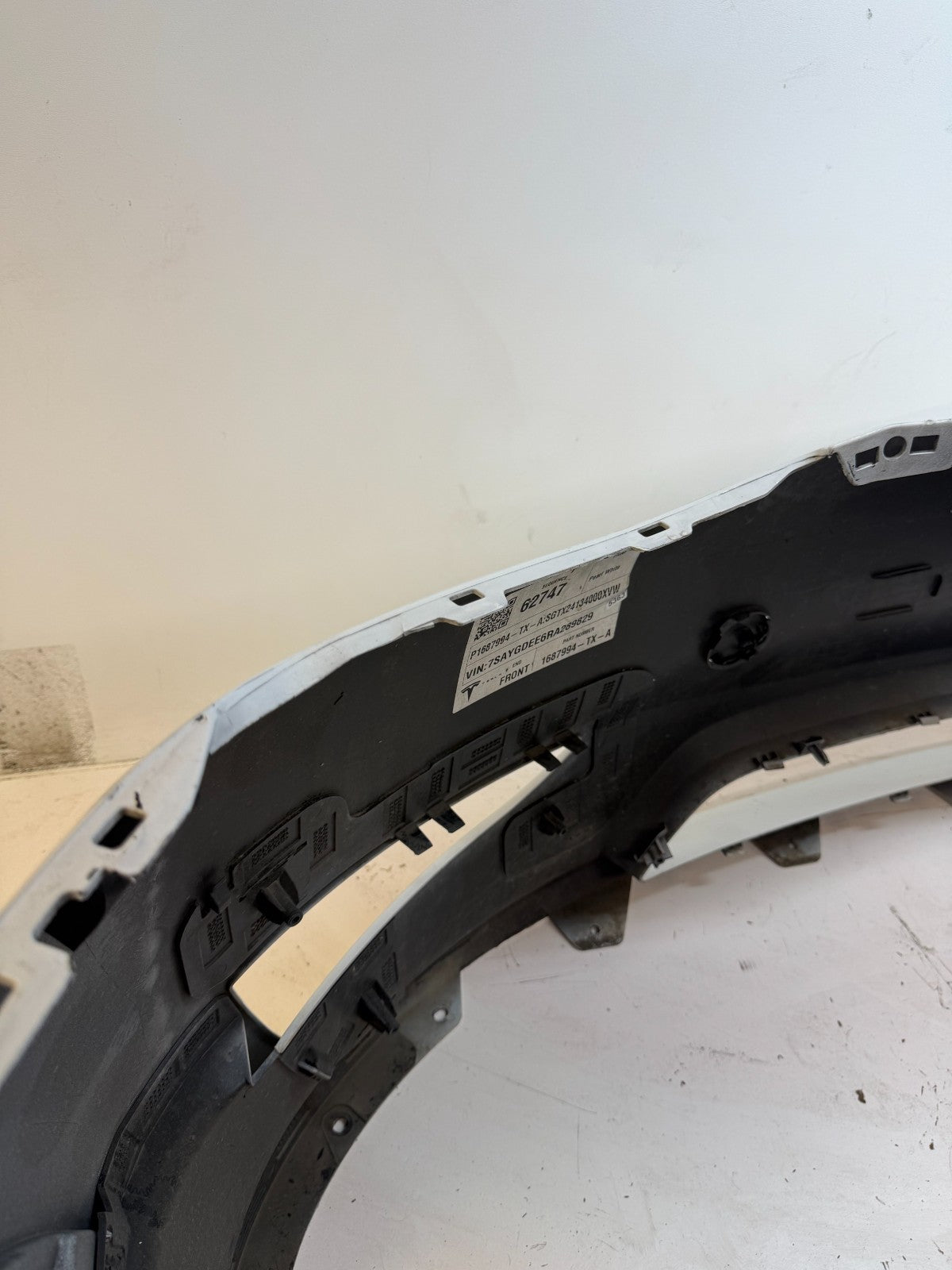 2022-2024 Tesla Model Y Front Bumper Cover w/o Sensor Holes OEM 1687994-TX-A
