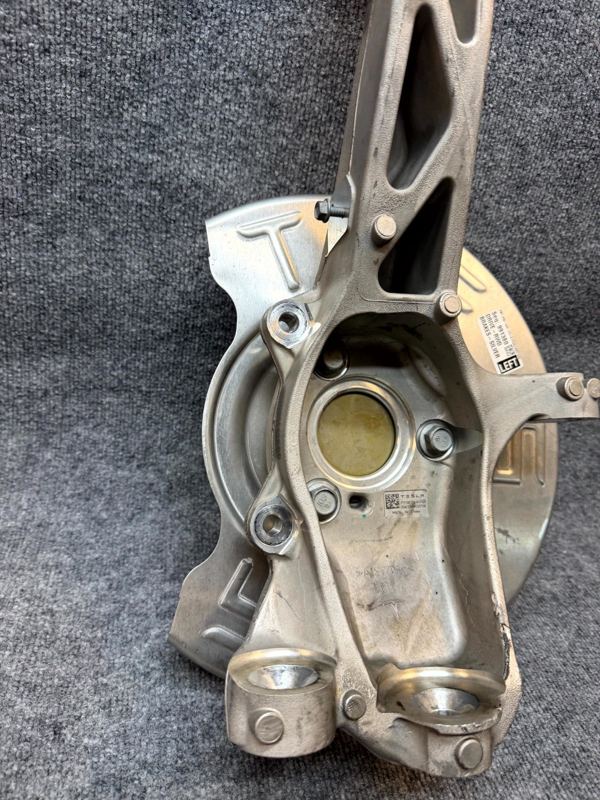 2020-2024 TESLA MODEL Y FRONT LEFT SPINDLE KNUCKLE HUB & SHIELD OEM,1188311-00-F