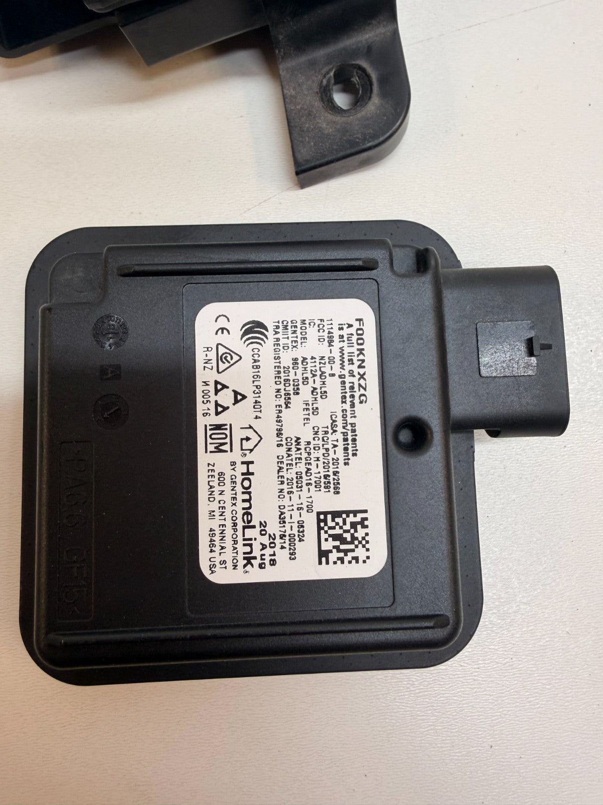 2012-17 Tesla Model S HomeLink Garage Door Opener Module W/ bracket 1114984-00-B