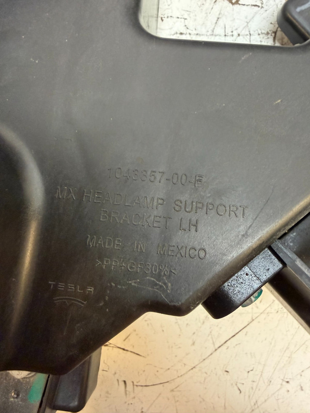 2016-2020 Model X Front Left Headlight Support Bracket OEM 1043357-00-F